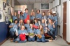 Group of employees in volunteer shirts